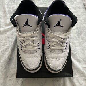 White and Black Sneakers with Purple Accents